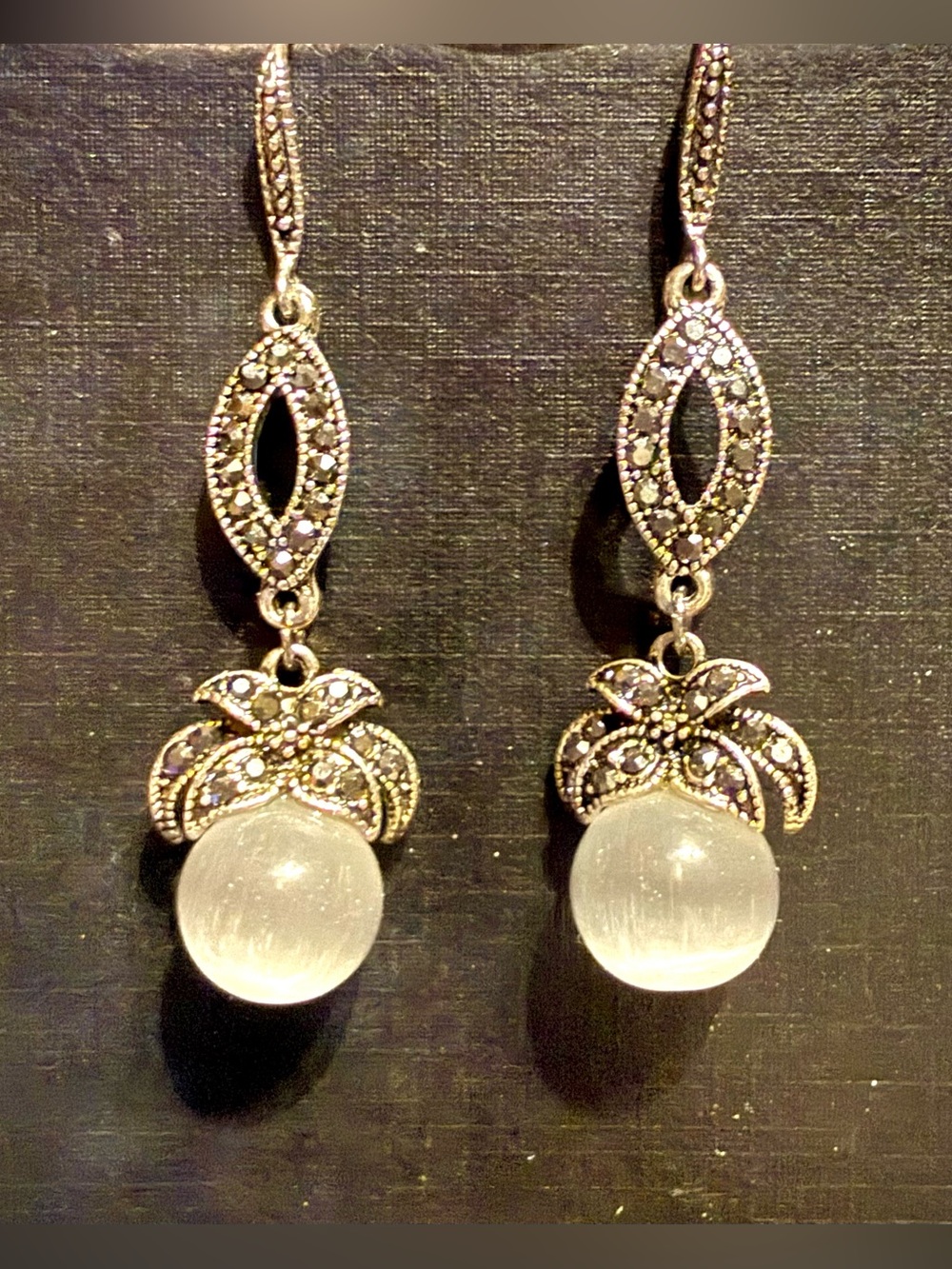 Silver Drop Earrings with White Cat's Eye Orbs